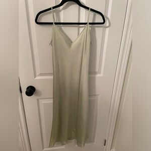 Aritzia’s Wilfred Only Midi Slip dress in a pale sage green
